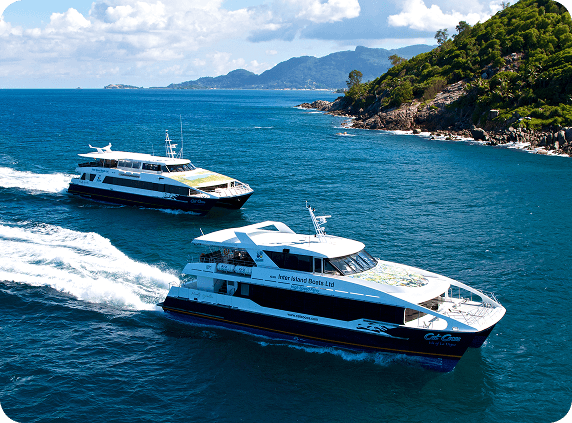 Seychelles ferry boats sailing through turquoise waters